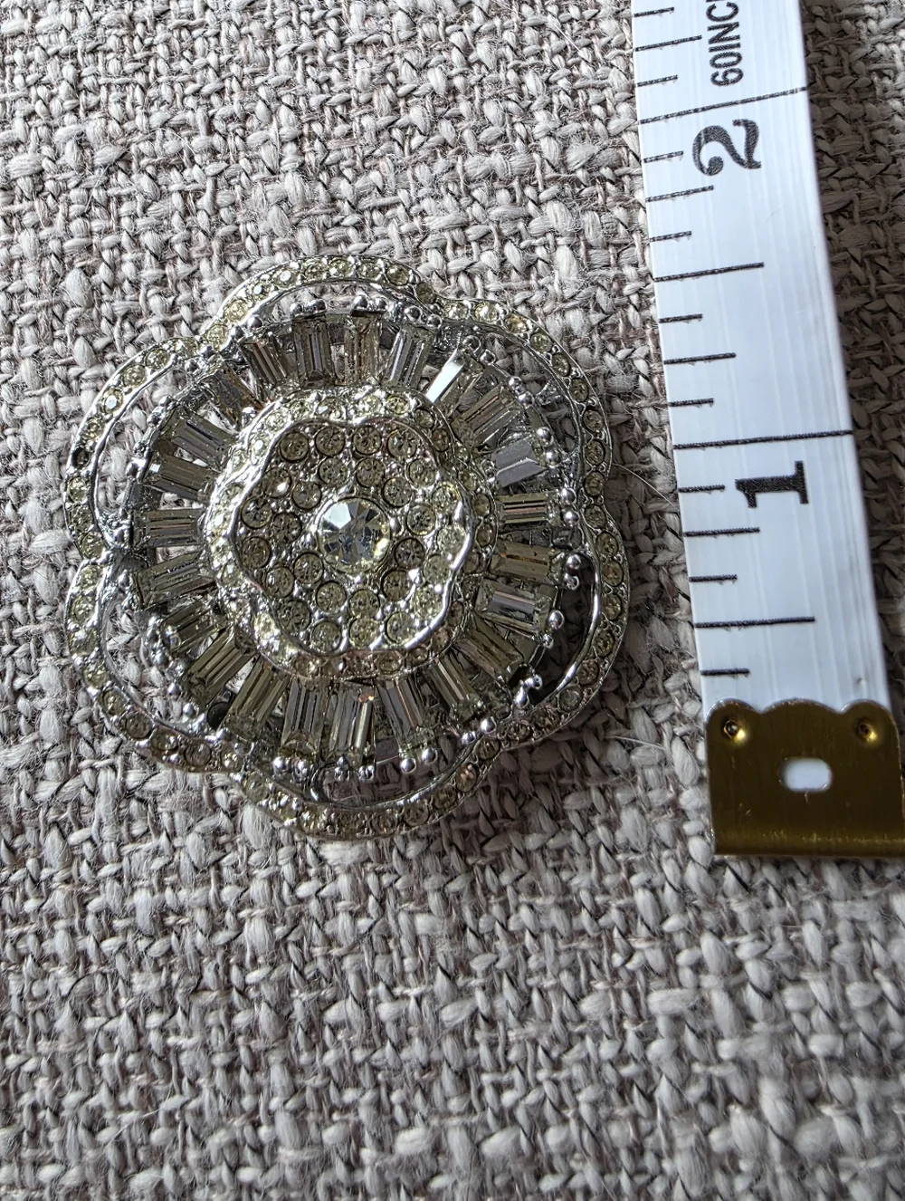 Vintage rhinestone brooch circular, tiered design with clear faceted rhinestones